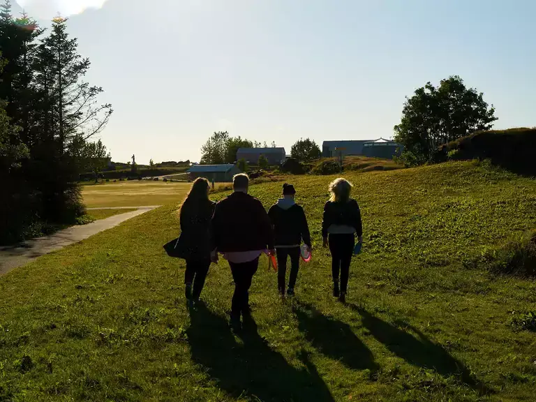 People walking on Víðistaðatún