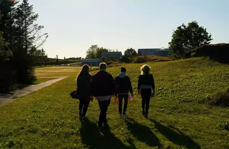 People walking on Víðistaðatún